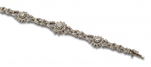 PULSERA DE FLORES DE DIAMANTES Y ORO BLANCO