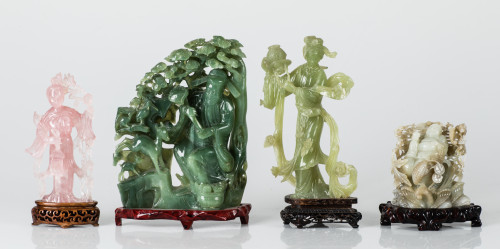 "Buda portando un ruyi en un paisaje", figura de jade verde