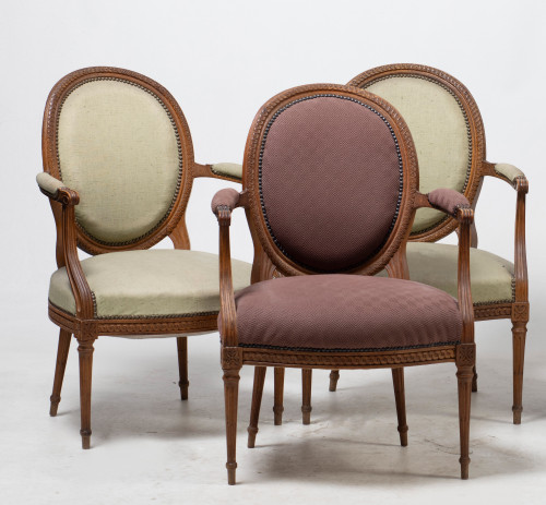 Three Louis XVI style arm chairs, France, 20th century