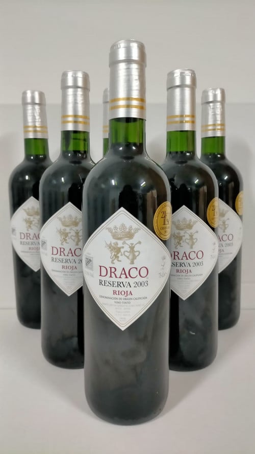 Estuche de madera con 6 botellas de 0,75 litros de Draco Re