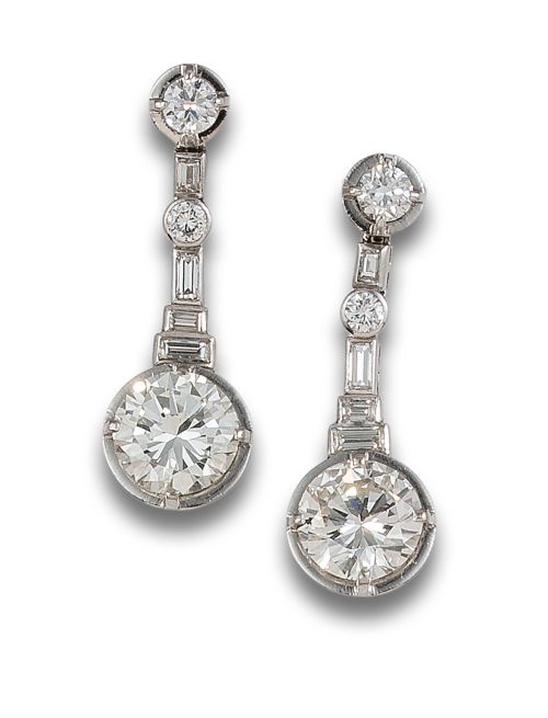 Pendientes en oro blanco con pareja de diamantes con un pes