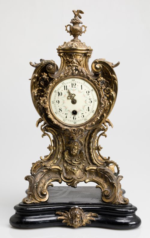 Rococo taste table clock, Germany, early 20th