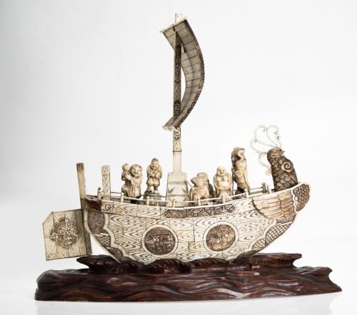 Boat made with inked bone plates, China, 20th century