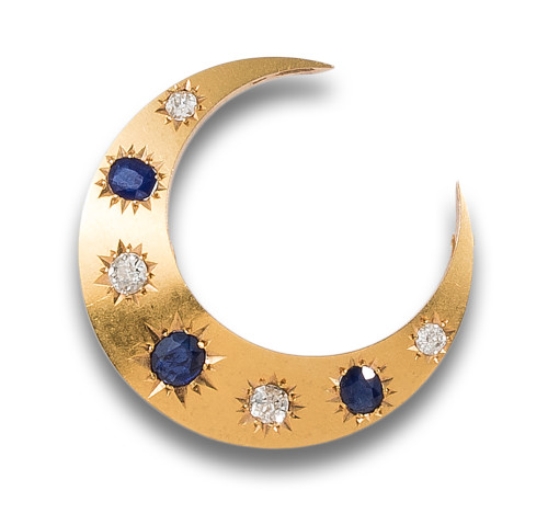 BROCHE EN FORMA DE LUNA EN ORO CON DIAMANTES Y ZAFIROS