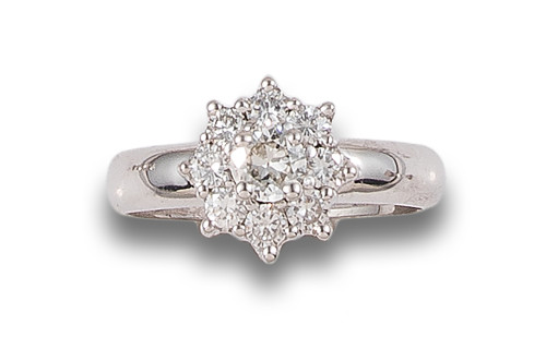 DIAMOND FLOWER RING, IN WHITE GOLD