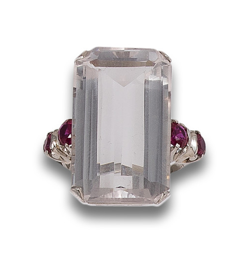 COLORLESS TOPAZ, SYNTHETIC RUBY AND PLATINUM COCKTAIL RING