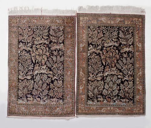 Pair of hand-knotted Persian wool rugs, 20th century