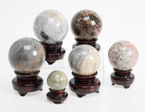 Six spheres of different marbles, 20th century