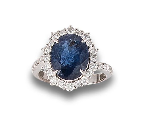 WHITE GOLD BURMAN SAPPHIRE AND DIAMONDS ROSETTE RING