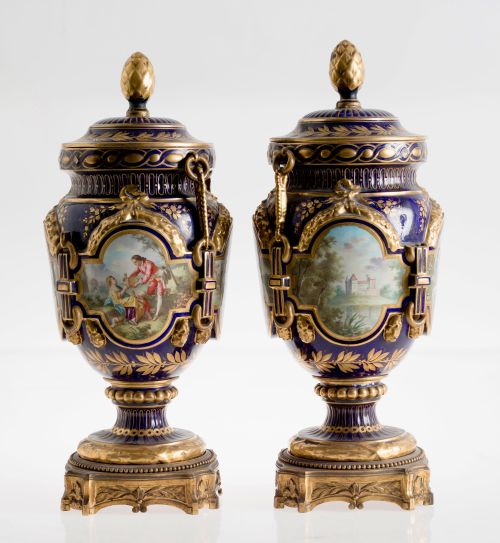 Pair of Sèvres-type porcelain vases with lids with bronze b