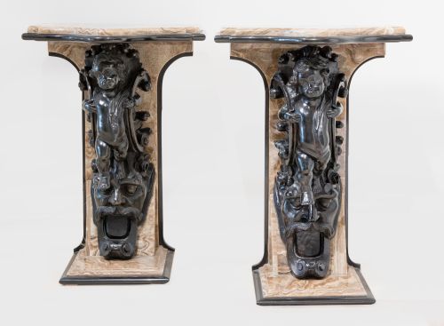 Pair of marble and ebonized wood bases, 20th century