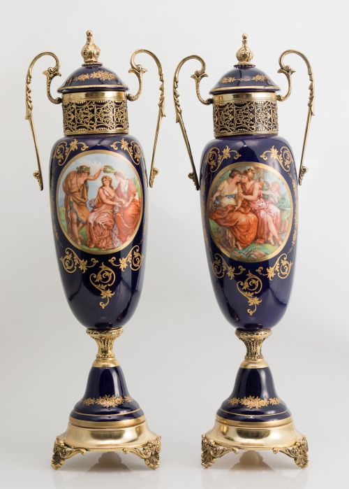 Pair of porcelain vases, glazed in blue, and gilded metal,