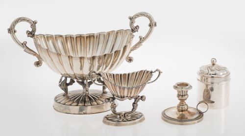 Two contrasting Spanish silver centerpieces, law 916, 20th