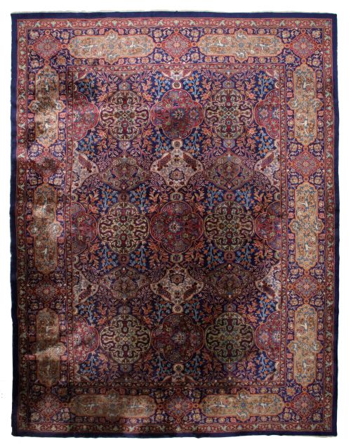 Hand-knotted Persian wool and silk rug, 20th century