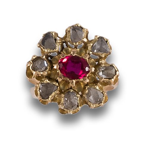 SYNTHETIC RUBY AND DIAMOND ROSETTE RING IN YELLOW GOLD