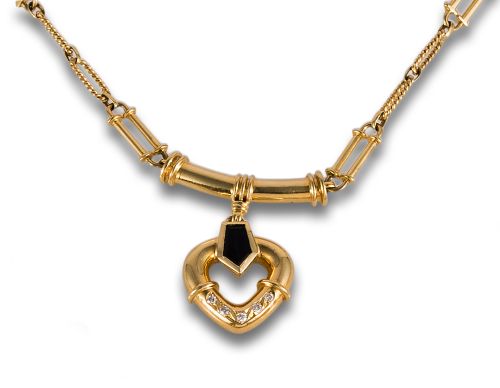 DIAMONDS AND SAPPHIRE NECKLACE, 1980s, IN YELLOW GOLD