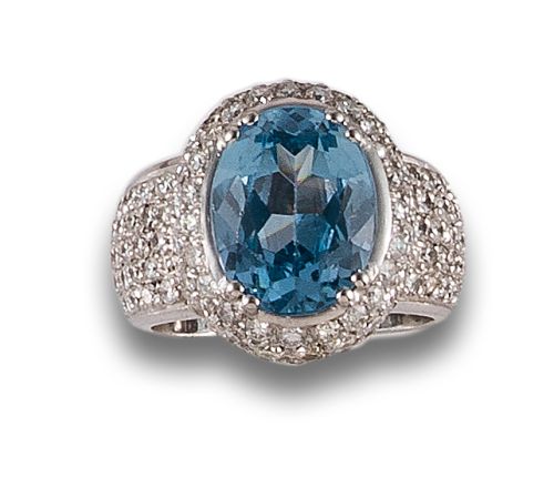 TOPAZ AND DIAMOND RING, IN WHITE GOLD