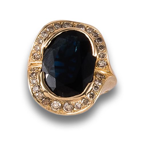 SAPPHIRE AND BROWN DIAMOND RING IN YELLOW GOLD