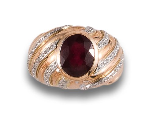 RUBY AND DIAMOND BOMBE RING, IN YELLOW GOLD