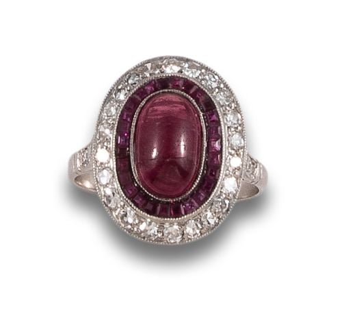 HALO RING WITH RUBIES AND DIAMONDS, IN PLATINUM