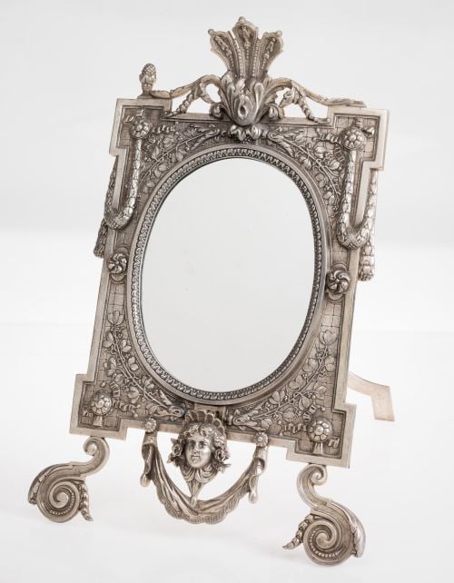 Neoclassical style vanity mirror in silver metal, 20th cent