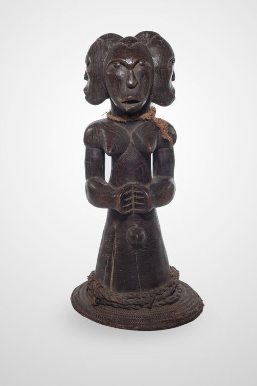 Three-faced Fang Okak statue, on a basket, Cameroon, c. 1970