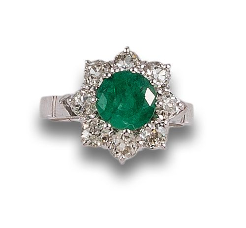 EMERALD AND DIAMOND FLOWER RING, IN WHITE GOLD