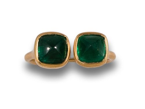 BYPASS RING OF EMERALDS AND YELLOW GOLD