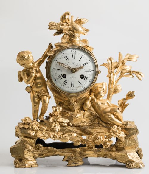 L. Mufson à Paris gilt bronze table clock