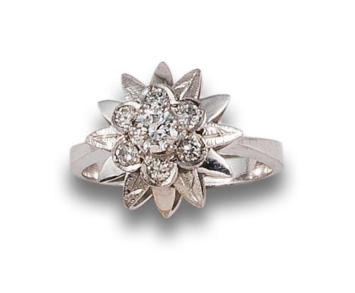 DIAMOND FLOWER RING, IN WHITE GOLD