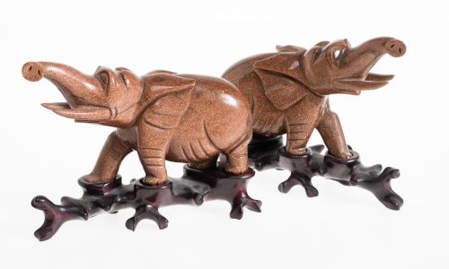 Pair of brown aventurine elephants, 20th century