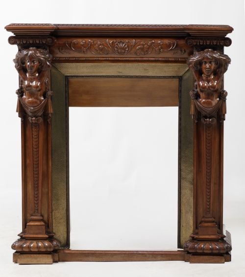 Carved oak fireplace front following 19th century models